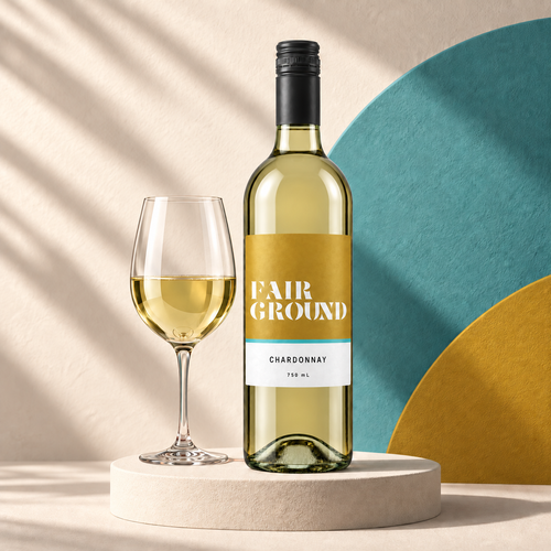 Fairground Chardonnay bottle and a glass of white wine on a cream plinth with a teal and label-coloured backdrop